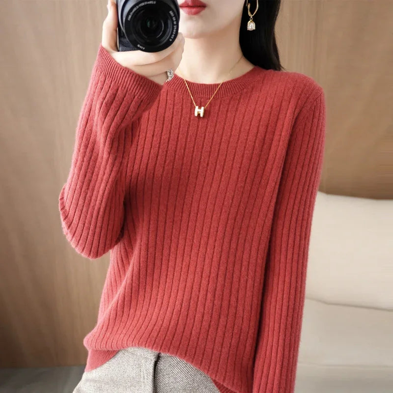 Striped winter sweater with a classic O-neck, long sleeves, and an elegant, modern design.