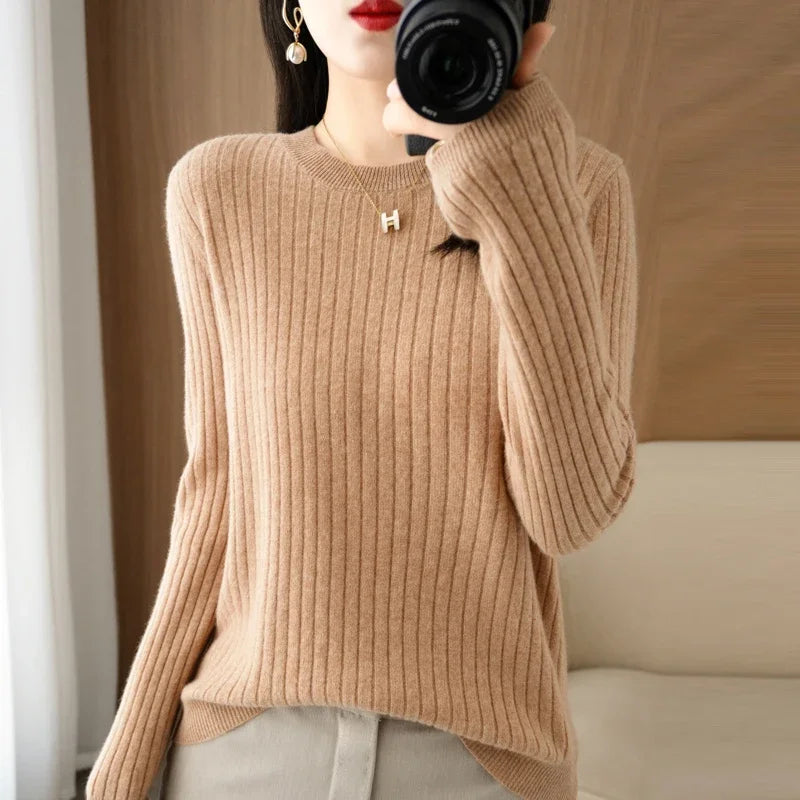 Striped winter sweater with a classic O-neck, long sleeves, and an elegant, modern design.