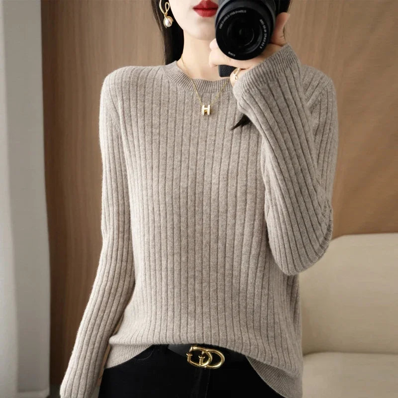 Striped winter sweater with a classic O-neck, long sleeves, and an elegant, modern design.