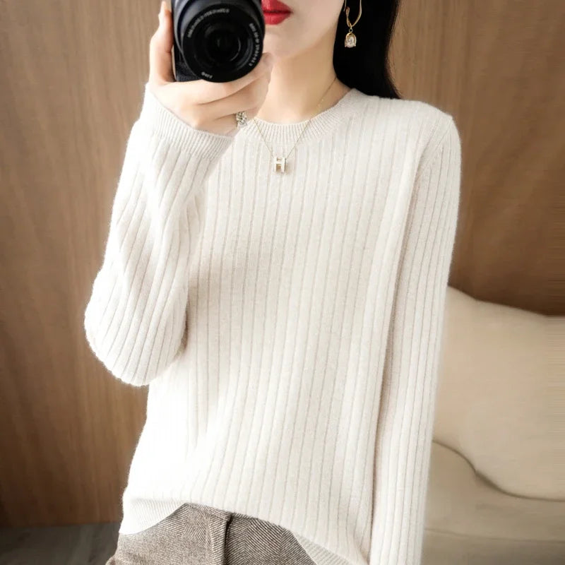 Striped winter sweater with a classic O-neck, long sleeves, and an elegant, modern design.