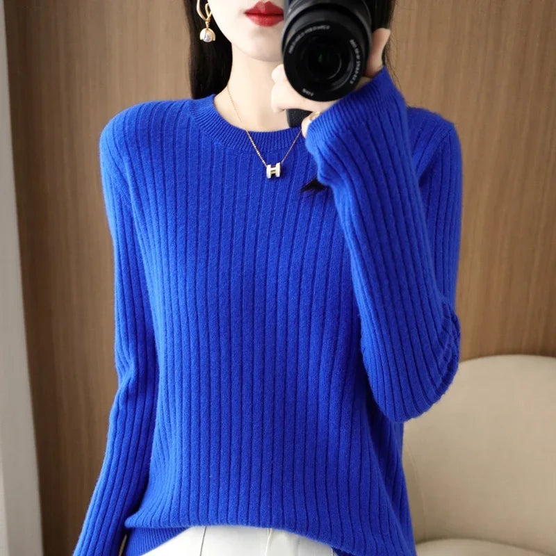 Striped winter sweater with a classic O-neck, long sleeves, and an elegant, modern design.