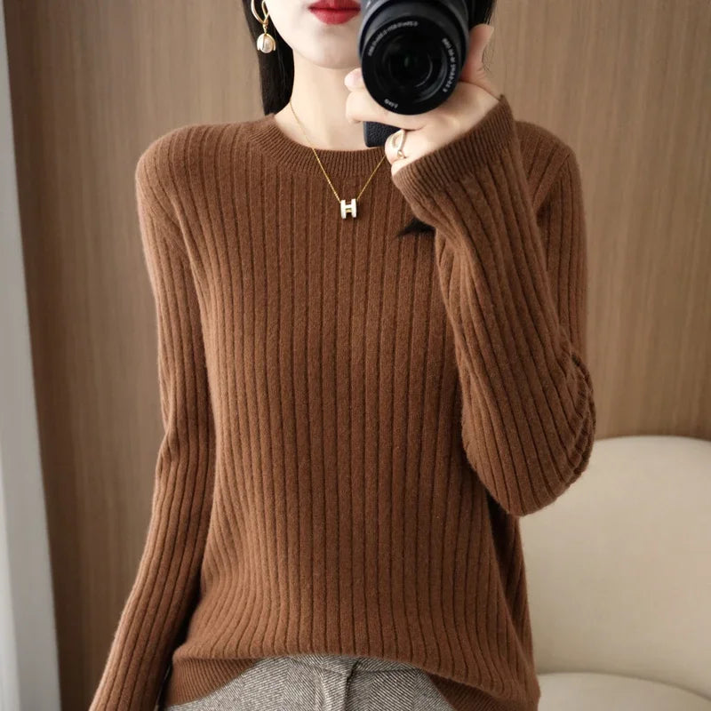 Striped winter sweater with a classic O-neck, long sleeves, and an elegant, modern design.