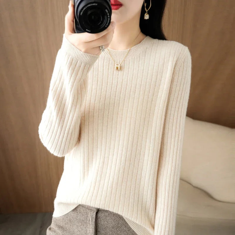 Striped winter sweater with a classic O-neck, long sleeves, and an elegant, modern design.