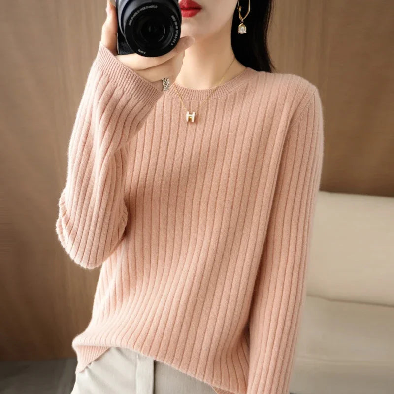 Striped winter sweater with a classic O-neck, long sleeves, and an elegant, modern design.
