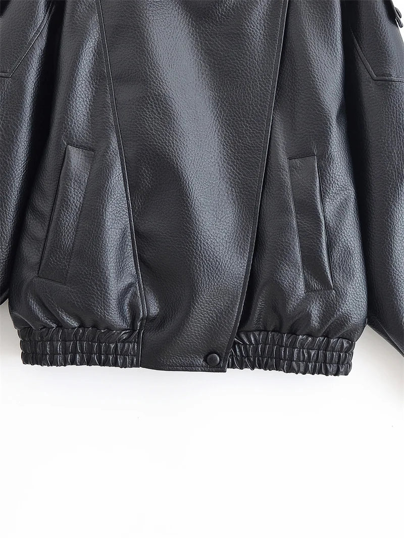 Black jacket in refined faux leather, modern cut and striking style.