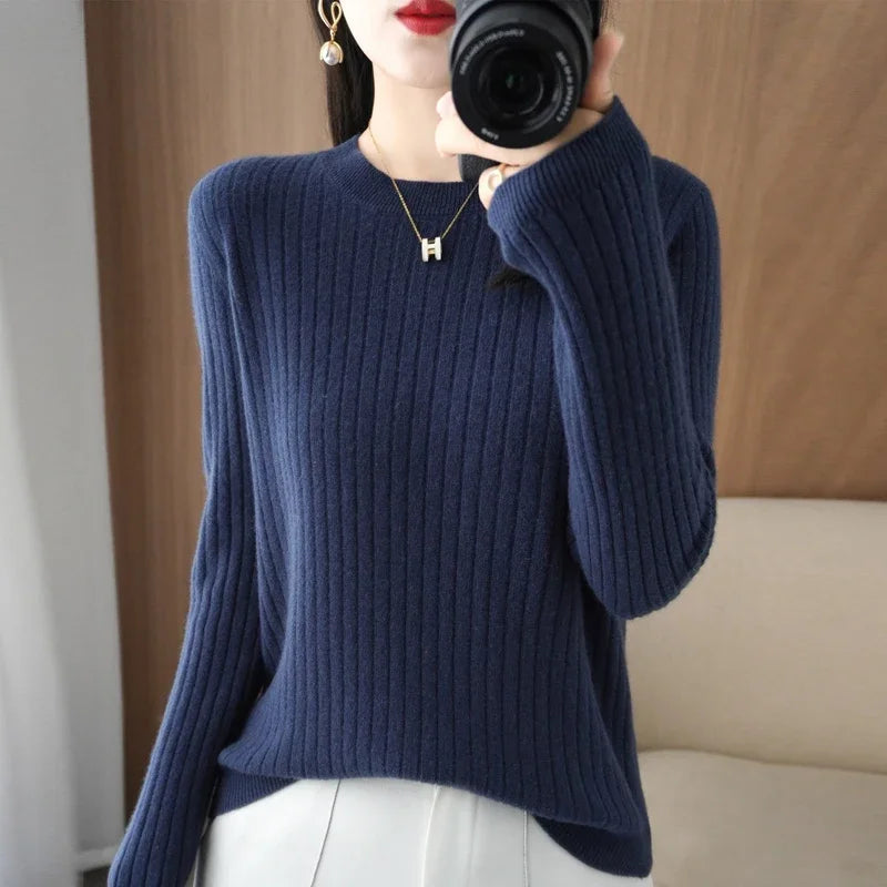 Striped winter sweater with a classic O-neck, long sleeves, and an elegant, modern design.