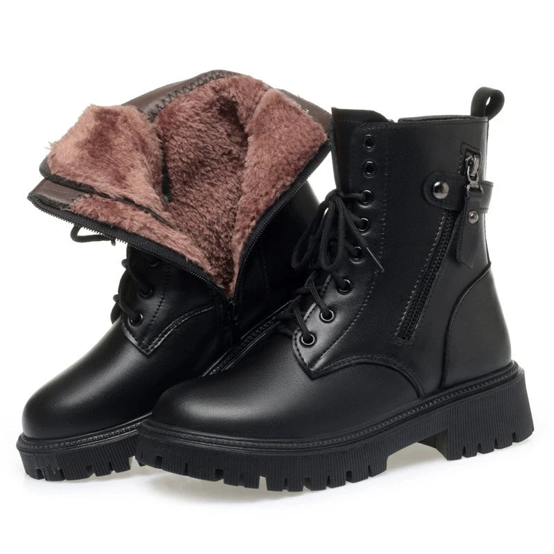 Women’s genuine leather ankle boots, warm and comfortable with a soft wool lining and zipper closure. Elegant, cozy, and perfect for cold days.