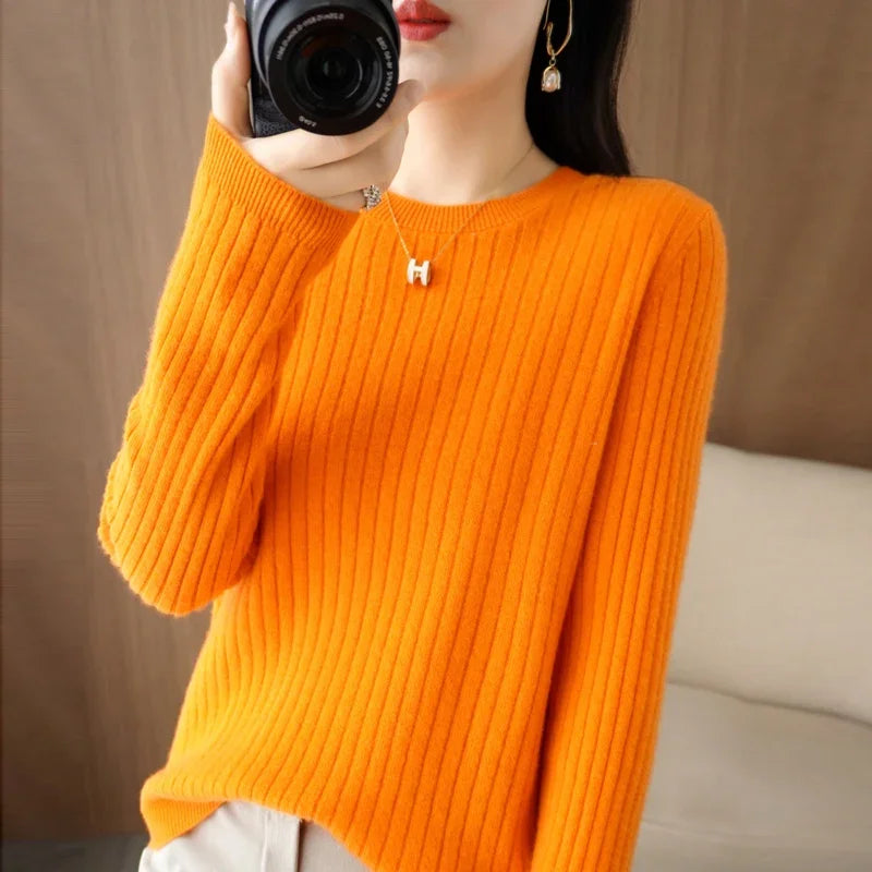 Striped winter sweater with a classic O-neck, long sleeves, and an elegant, modern design.