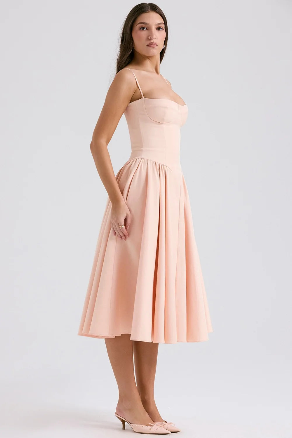 Vintage floral midi dress with a high waist and A-line silhouette, sundress style, perfect for daytime wear and evening events, available in white.