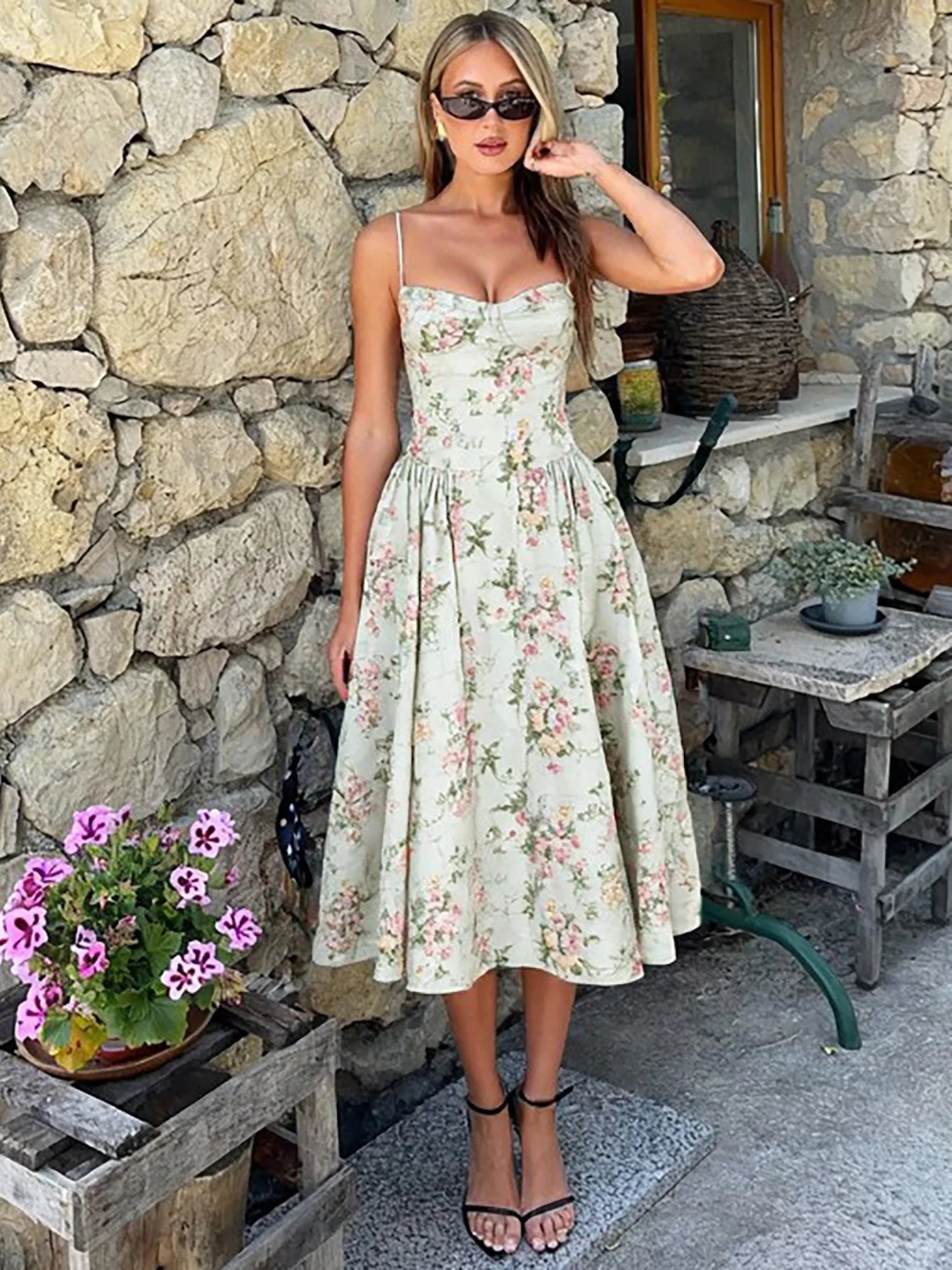 Vintage floral midi dress with a high waist and A-line silhouette, sundress style, perfect for daytime wear and evening events, available in white.